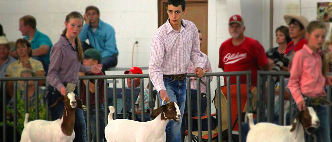 Jacob Leyva holding a lamb