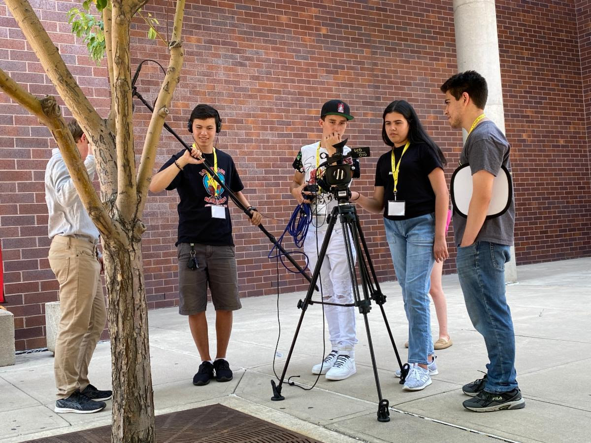 Students working with camera