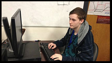 Garrett Williams working at a computer
